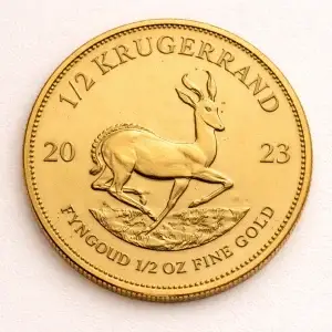 Gold Half Krugerrand bullion coin on a light premium studio background